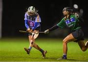 28 January 2020; Clodagh McIntyre of UCD in action against Sinead O'Keefe of Athlone IT during the Purcell Cup Camogie Championship Round 2 match between UCD and Athlone IT at UCD Belfield in Dublin. Photo by Matt Browne/Sportsfile