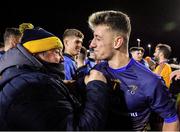 29 January 2020; Evan Comerford of DCU Dóchas Éireann, right, is congratulated by logistics manager Krzysztof Jendrulok following their side's victory of the Sigerson Cup Final match between DCU Dóchas Éireann and IT Carlow at Dublin City University Sportsgrounds in Glasnevin, Dublin. Photo by Seb Daly/Sportsfile