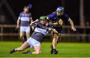 30 January 2020; Máirtín de Paor of WIT in action against Rian McBride of DCU Dóchas Éireann during the Fitzgibbon Cup Quarter-Final match between DCU Dóchas Éireann and WIT at Dublin City University Sportsgrounds, Glasnevin, Dublin. Photo by Brendan Moran/Sportsfile