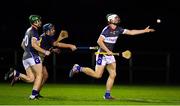 30 January 2020; Ciaran Kirwan of WIT gets a handpass away ahead of Conor Firman of DCU Dóchas Éireann during the Fitzgibbon Cup Quarter-Final match between DCU Dóchas Éireann and WIT at Dublin City University Sportsgrounds, Glasnevin, Dublin. Photo by Brendan Moran/Sportsfile