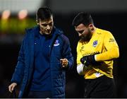 30 January 2020; Ross Treacy of Drogheda United leaves the field with an injury assisted by Drogheda United physio David Cook during the Jim Malone Cup match between Dundalk and Drogheda United at Oriel Park in Dundalk, Co Louth. Photo by Harry Murphy/Sportsfile