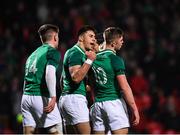 31 January 2020; Jack Crowley of Ireland, right, celebrates after scoring his side's third try with team-mates Dan Kelly, centre, and Ethan McIlroy during the U20 Six Nations Rugby Championship match between Ireland and Scotland at Irish Independent Park in Cork. Photo by Harry Murphy/Sportsfile