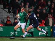 31 January 2020; Jack Crowley of Ireland avoids the tackle of Ollie Smith of Scotland on his way to scoring his side's third try during the U20 Six Nations Rugby Championship match between Ireland and Scotland at Irish Independent Park in Cork. Photo by Harry Murphy/Sportsfile