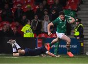 31 January 2020; Andrew Smith of Ireland escapes the tackle of Roan Frostwick of Scotland on his way to scoring his side's fourth try during the U20 Six Nations Rugby Championship match between Ireland and Scotland at Irish Independent Park in Cork. Photo by Harry Murphy/Sportsfile