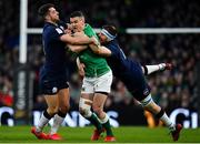 1 February 2020; Jonathan Sexton of Ireland is tackled by Adam Hastings, left, and Nick Haining of Scotland during the Guinness Six Nations Rugby Championship match between Ireland and Scotland at the Aviva Stadium in Dublin. Photo by Brendan Moran/Sportsfile