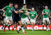 1 February 2020; Conor Murray of Ireland is tackled by Adam Hastings of Scotland during the Guinness Six Nations Rugby Championship match between Ireland and Scotland at the Aviva Stadium in Dublin. Photo by Ramsey Cardy/Sportsfile