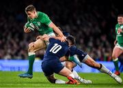 1 February 2020; Garry Ringrose of Ireland is tackled by Fraser Brown and Adam Hastings, 10, of Scotland during the Guinness Six Nations Rugby Championship match between Ireland and Scotland at the Aviva Stadium in Dublin. Photo by Brendan Moran/Sportsfile