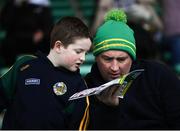 1 February 2020; Conor Dalton, aged 7, reads the match programme with his father Charles Dalton, from Asdee, Co. Kerry prior to the Allianz Football League Division 1 Round 2 match between Kerry and Galway at Austin Stack Park in Tralee, Kerry. Photo by Diarmuid Greene/Sportsfile