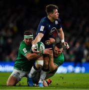 1 February 2020; Huw Jones of Scotland is tackled by Rob Herring and Andrew Conway of Ireland during the Guinness Six Nations Rugby Championship match between Ireland and Scotland at the Aviva Stadium in Dublin. Photo by Brendan Moran/Sportsfile