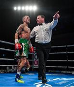 1 February 2020; David Oliver Joyce is ushered back to his corner by referee Harold Foster after knocking down Lee Haskins in their WBO European super-bantamweight title bout at the Ulster Hall in Belfast. Photo by David Fitzgerald/Sportsfile