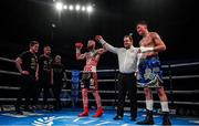 1 February 2020; Lewis Crocker is declared victorious after defeating John Thain in their welterweight bout at the Ulster Hall in Belfast. Photo by David Fitzgerald/Sportsfile
