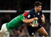 1 February 2020; Huw Jones of Scotland is tackled by Josh van der Flier of Ireland during the Guinness Six Nations Rugby Championship match between Ireland and Scotland at the Aviva Stadium in Dublin. Photo by Brendan Moran/Sportsfile