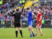 2 February 2020; Darren Hughes of Monaghan is issued a black card by referee David Gough for a foul on Peter Harte of Tyrone, right, during the Allianz Football League Division 1 Round 2 match between Monaghan and Tyrone at St. Mary's Park in Castleblayney, Monaghan. Photo by Oliver McVeigh/Sportsfile