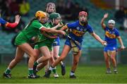 2 February 2020; Karin Blair of Tipperary in action against Noirin Lenihan and Muireann Creamer of Limerick during the Littlewoods Ireland National Camogie League Division 1 match between Limerick and Tipperary at LIT Gaelic Grounds in Limerick. Photo by Diarmuid Greene/Sportsfile