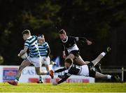 3 February 2020; Dylan Maher of St Gerard's School escapes the tackle of Tadhg Brophy of Newbridge College during the Bank of Ireland Leinster Schools Junior Cup First Round match between Newbridge College and St Gerard’s School at Templeville Road in Dublin. Photo by Harry Murphy/Sportsfile