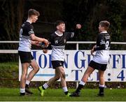 3 February 2020; Tadhg Brophy of Newbridge College celebrates after scoring his side's second try with team-mates John Collins, left, and Ciaran Mangan during the Bank of Ireland Leinster Schools Junior Cup First Round match between Newbridge College and St Gerard’s School at Templeville Road in Dublin. Photo by Harry Murphy/Sportsfile