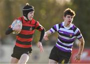 5 February 2020; Jack Mackey of Kilkenny College gets past Eoghan Walsh of Terenure College during the Bank of Ireland Leinster Schools Junior Cup First Round match between Terenure College and Kilkenny College at Naas RFC in Naas, Kildare. Photo by Piaras Ó Mídheach/Sportsfile