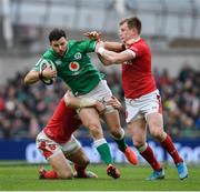 8 February 2020; Robbie Henshaw of Ireland is tackled by Hadleigh Parkes, left, and Nick Tompkins of Wales during the Guinness Six Nations Rugby Championship match between Ireland and Wales at the Aviva Stadium in Dublin. Photo by Ramsey Cardy/Sportsfile