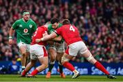 8 February 2020; Robbie Henshaw of Ireland is tackled by Dillon Lewis, left, and Jake Ball of Wales during the Guinness Six Nations Rugby Championship match between Ireland and Wales at Aviva Stadium in Dublin. Photo by Brendan Moran/Sportsfile