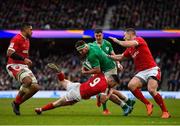 8 February 2020; Rob Herring of Ireland is tackled by Tomos Williams of Wales during the Guinness Six Nations Rugby Championship match between Ireland and Wales at Aviva Stadium in Dublin. Photo by Brendan Moran/Sportsfile
