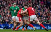 8 February 2020; Robbie Henshaw of Ireland is tackled by Dillon Lewis and Jake Ball of Wales during the Guinness Six Nations Rugby Championship match between Ireland and Wales at Aviva Stadium in Dublin. Photo by Brendan Moran/Sportsfile