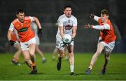 8 February 2020; David Hyland of Kildare in action against Oisín O'Neill, left, and Conor Turbitt of Armagh during the Allianz Football League Division 2 Round 3 match between Armagh and Kildare at Athletic Grounds in Armagh. Photo by Piaras Ó Mídheach/Sportsfile