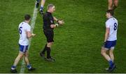 8 February 2020; Referee Ciaran Branagan shows his watch to Darren Hughes of Monaghan following the Allianz Football League Division 1 Round 3 match between Dublin and Monaghan at Croke Park in Dublin. Photo by Stephen McCarthy/Sportsfile