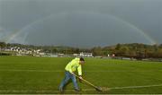9 February 2020; St Eunan's club official Andy McGlynn clears water off of the pitch, with a rainbow in the distance, before the Allianz Football League Division 1 Round 3 match between Donegal and Galway at O'Donnell Park in Letterkenny, Donegal. Photo by Oliver McVeigh/Sportsfile