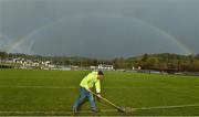 9 February 2020; St Eunan's club official Andy McGlynn clears water off of the pitch, with a rainbow in the distance, before the Allianz Football League Division 1 Round 3 match between Donegal and Galway at O'Donnell Park in Letterkenny, Donegal. Photo by Oliver McVeigh/Sportsfile