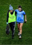 8 February 2020; Kate Sullivan of Dublin leaves the pitch assisted by team physiotherapist Anita O'Brien during the Lidl Ladies National Football League Division 1 Round 3 match between Dublin and Cork at Croke Park in Dublin. Photo by Stephen McCarthy/Sportsfile