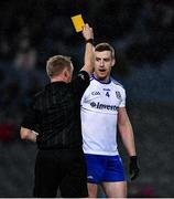 8 February 2020; Referee Ciaran Branagan issues a yellow card to Kieran Duffy of Monaghan before starting the second half of the Allianz Football League Division 1 Round 3 match between Dublin and Monaghan at Croke Park in Dublin. Photo by Ray McManus/Sportsfile