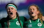 9 February 2020; Anna Caplice, left, and Kathryn Dane of Ireland sing the national anthem prior to the Women's Six Nations Rugby Championship match between Ireland and Wales at Energia Park in Dublin. Photo by Ramsey Cardy/Sportsfile