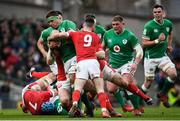 8 February 2020; CJ Stander of Ireland is tackled by Tomos Williams of Wales during the Guinness Six Nations Rugby Championship match between Ireland and Wales at the Aviva Stadium in Dublin. Photo by Ramsey Cardy/Sportsfile