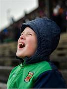 9 February 2020; Jack Buckley, aged 10, from Ballyhaunis, Co. Mayo, catches rain in his mouth prior to the Allianz Football League Division 1 Round 3 match between Meath and Mayo at Páirc Tailteann in Navan, Meath. Photo by Seb Daly/Sportsfile
