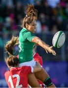 9 February 2020; Sene Naoupu of Ireland is tackled by Kerin Lake, left, and Kelsey Jones of Wales as she offloads for her side's second try during the Women's Six Nations Rugby Championship match between Ireland and Wales at Energia Park in Dublin. Photo by Ramsey Cardy/Sportsfile