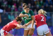 9 February 2020; Sene Naoupu of Ireland is tackled by Kerin Lake, left, and Kelsey Jones of Wales during the Women's Six Nations Rugby Championship match between Ireland and Wales at Energia Park in Dublin. Photo by Ramsey Cardy/Sportsfile