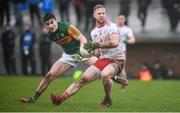 9 February 2020; Frank Burns of Tyrone in action against Seán O'Shea of Kerry during the Allianz Football League Division 1 Round 3 match between Tyrone and Kerry at Edendork GAC in Dungannon, Co Tyrone. Photo by David Fitzgerald/Sportsfile