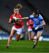 8 February 2020; Maire O'Callaghan of Cork in action against Muireann Ni Scanaill of Dublin during the Lidl Ladies National Football League Division 1 Round 3 match between Dublin and Cork at Croke Park in Dublin. Photo by Ray McManus/Sportsfile