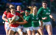 9 February 2020; Jasmine Joyce of Wales is tackled by Aoife McDermott, left, and Lindsay Peat of Ireland during the Women's Six Nations Rugby Championship match between Ireland and Wales at Energia Park in Dublin. Photo by Ramsey Cardy/Sportsfile