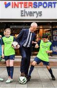 10 February 2020; The Football Association of Ireland are delighted to announce a new partnership with the leading Irish sports retailer INTERSPORT Elverys, as the new title sponsor of the FAI Summer Soccer Schools. Pictured at the announcement is Republic of Ireland manager Mick McCarthy with Larkin Community College students Isabelle Baker and Remis Galiceanu at INTERSPORT Elverys, Henry Street in Dublin. Photo by Stephen McCarthy/Sportsfile