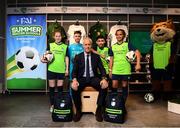 10 February 2020; The Football Association of Ireland are delighted to announce a new partnership with the leading Irish sports retailer INTERSPORT Elverys, as the new title sponsor of the FAI Summer Soccer Schools. Pictured at the announcement is Republic of Ireland manager Mick McCarthy with Larkin Community College students, from left, Isabelle Baker, Adrian Lucaci, Remis Galiceanu and Alisha Rose Sammy at INTERSPORT Elverys, Henry Street in Dublin. Photo by Stephen McCarthy/Sportsfile
