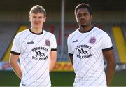 12 February 2020; Kris Twardek, left, and Andre Wright during the launch of the Bohemians FC 2020 away jersey at Dalymount Park in Dublin. Bohemian FC launched their 2020 away jersey, with the iconic and harrowing image of a family fleeing war taking centre place. They’re launching the away jersey in partnership with Amnesty International Ireland, to campaign together for an end to the Direct Provision system. Photo by Stephen McCarthy/Sportsfile