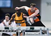 25 January 2020; Darragh Miniter of Nenagh Olympic AC, Tipperary, competing in the Junior Men's 60m Hurdles during the Irish Life Health National Indoor Junior and U23 Championships at the AIT Indoor Arena in Athlone, Westmeath. Photo by Sam Barnes/Sportsfile