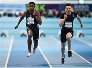 12 February 2020; Ojie Edoburun of Great Britain on his way to winning his heat of the Wild Atlantic Apartments Men's 60m event, from third place Kyle de Escofet of Great Britain, right, during the AIT International Grand Prix 2020 at AIT International Arena in Athlone, Westmeath. Photo by Sam Barnes/Sportsfile