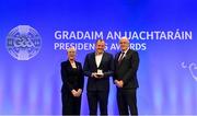 14 February 2020; Pat Gorham of Orang Éire GAA, Malaysia, is presented with the International Award by Maolmhuire Tynan, Head of Public Affairs AIB, and Uachtarán Chumann Lúthchleas Gael John Horan during the GAA President’s Awards at Croke Park in Dublin. Photo by Piaras Ó Mídheach/Sportsfile