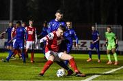 14 February 2020; Ronan Hale of St Patrick's Athletic in action against Robert McCourt of Waterford United during the SSE Airtricity League Premier Division match between St Patrick's Athletic and Waterford at Richmond Park in Dublin. Photo by Sam Barnes/Sportsfile