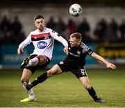 14 February 2020; Conor McCormack of Derry City and Jordan Flores of Dundalk during the SSE Airtricity League Premier Division match between Dundalk and Derry City at Oriel Park in Dundalk, Louth. Photo by Stephen McCarthy/Sportsfile