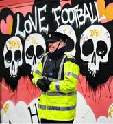 15 February 2020; A member of An Garda Síochána watches on ahead of the SSE Airtricity League Premier Division match between Bohemians and Shamrock Rovers at Dalymount Park in Dublin. Photo by Stephen McCarthy/Sportsfile