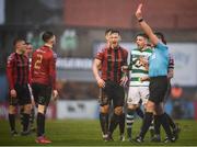 15 February 2020; Referee Rob Hennessy issues a red card to Andy Lyons, 2, of Bohemians during the SSE Airtricity League Premier Division match between Bohemians and Shamrock Rovers at Dalymount Park in Dublin. Photo by Stephen McCarthy/Sportsfile