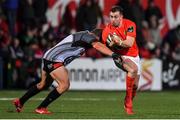 14 February 2020; JJ Hanrahan of Munster is tackled by Schalk Ferreira of Isuzu Southern Kings during the Guinness PRO14 Round 11 match between Munster and Isuzu Southern Kings at Irish Independent Park in Cork. Photo by Brendan Moran/Sportsfile